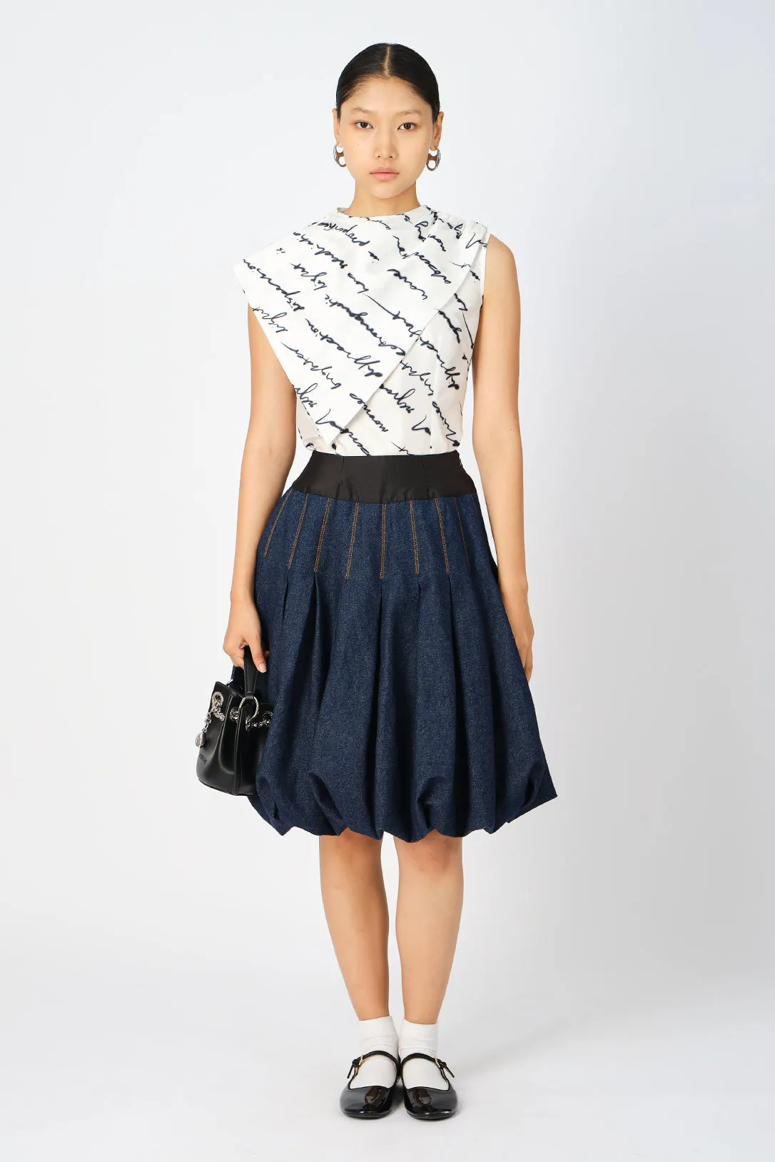 Millie box-pleated denim skirt
