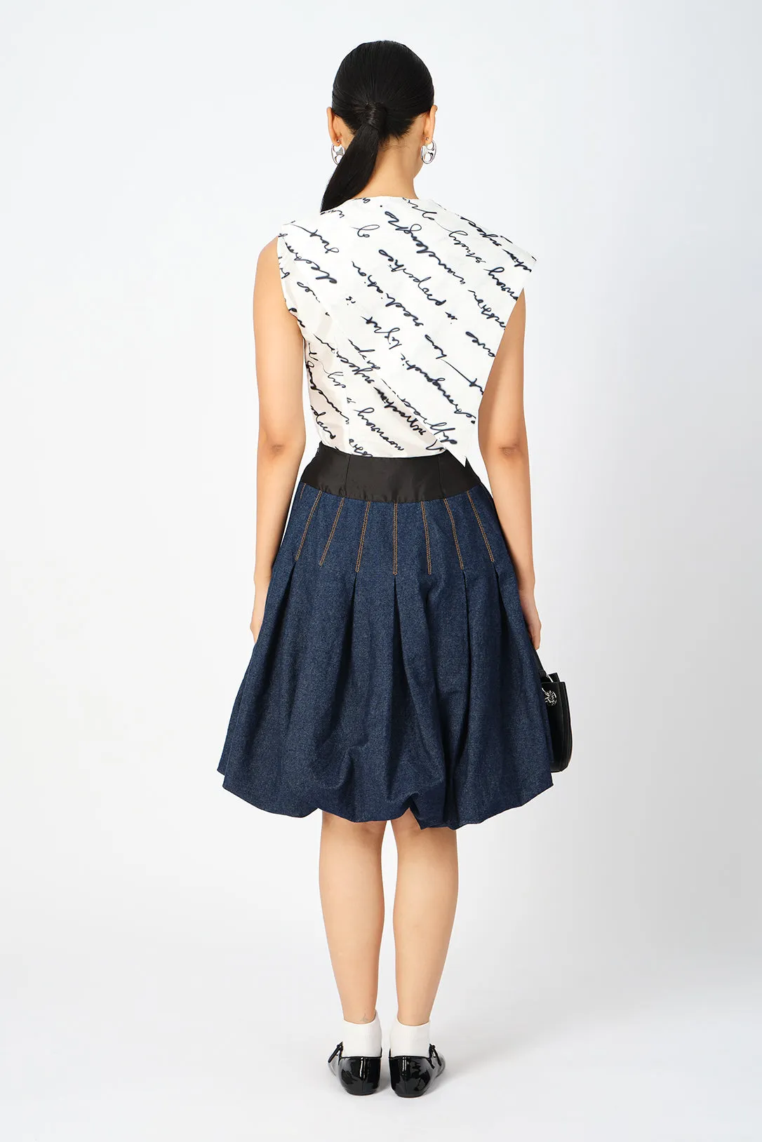Millie box-pleated denim skirt